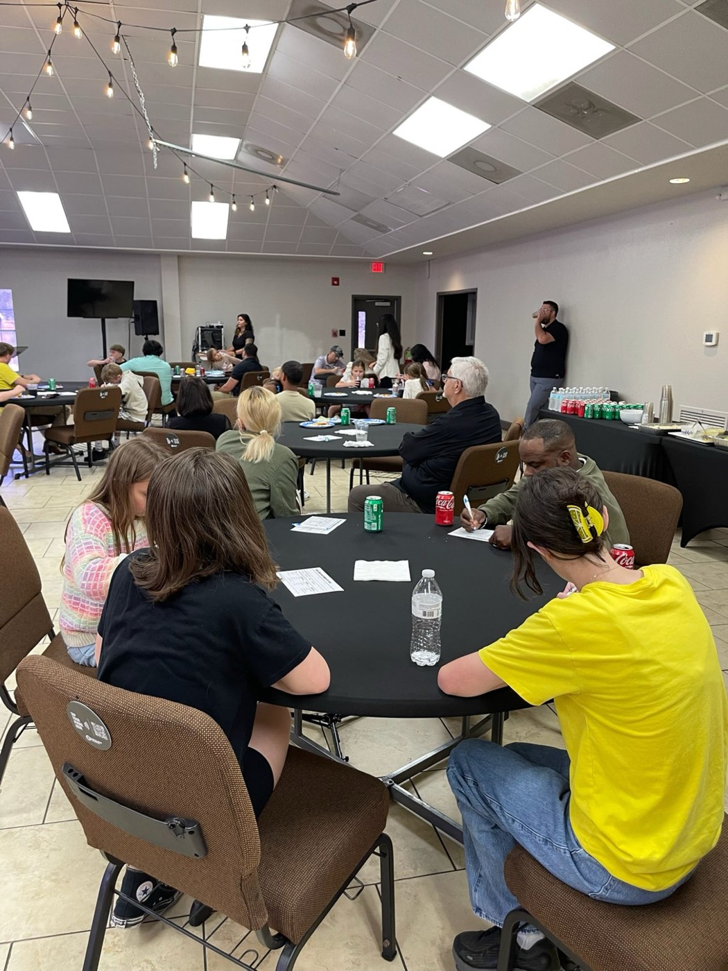 Families sharing lunch together at church