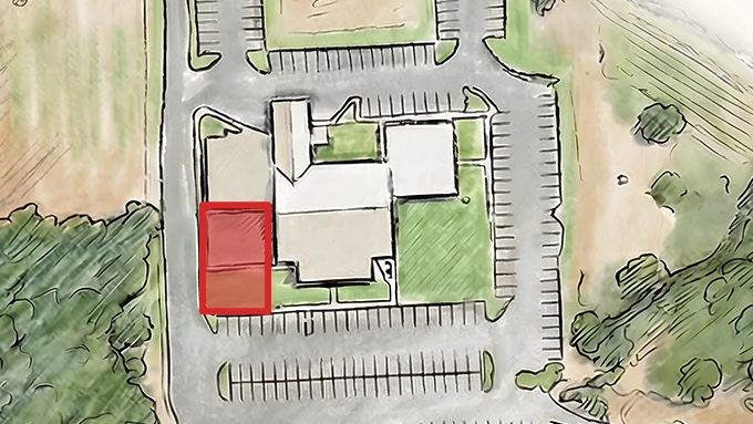 Drawing of the church property with the new kids building marked in red beside the main building